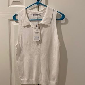 Sleeveless sweater top.